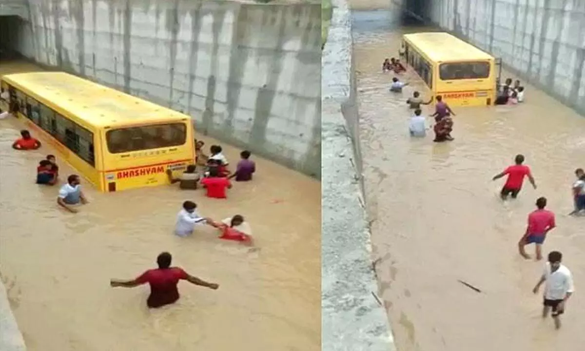 School bus strucks in flood water in Mahabubnagar district