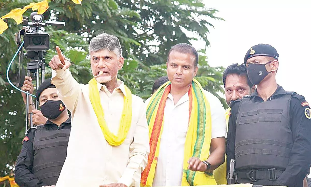 TDP national president N Chandrababu Naidu along with party Nagari segment in-charge Gali Bhanu Prakash at a roadshow on Friday