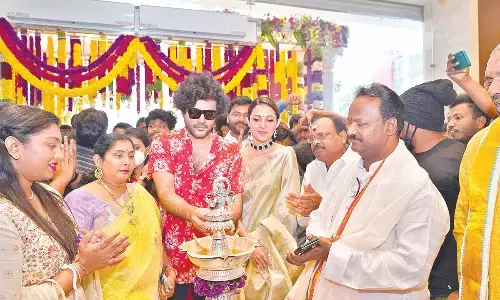 DJ Tillu famed Siddu Jonnalagadda and Neha Shetty inaugurating RS Brothers showroom in Tirupati on Saturday. DJ Tillu famed Siddu Jonnalagadda and Neha Shetty inaugurating RS Brothers showroom in Tirupati on Saturday.