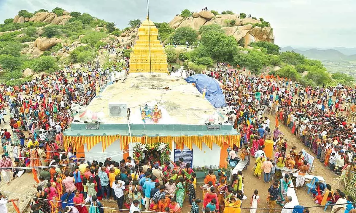 Devotees at Sri Ramalingeswara Swamy temple on the hillock of Vinukonda on Sunday