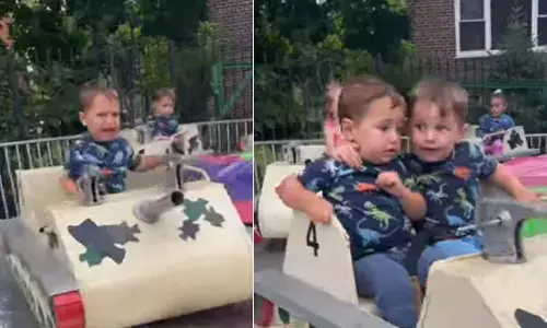 The picture depicts a ride with several children.