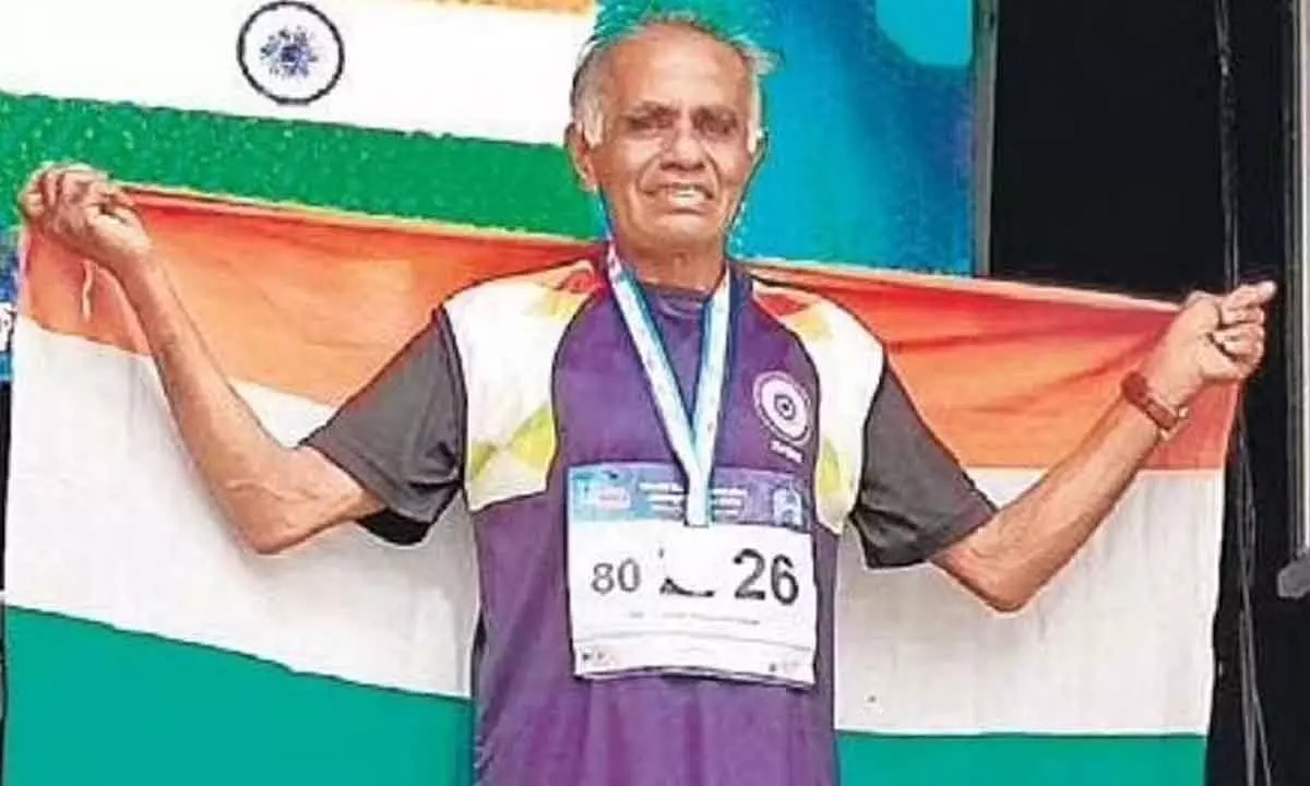 Former CPM MLA MJ Jacob after receiving the bronze medal at the World Masters Athletics Championship in Finland. (Photo| Twitter)