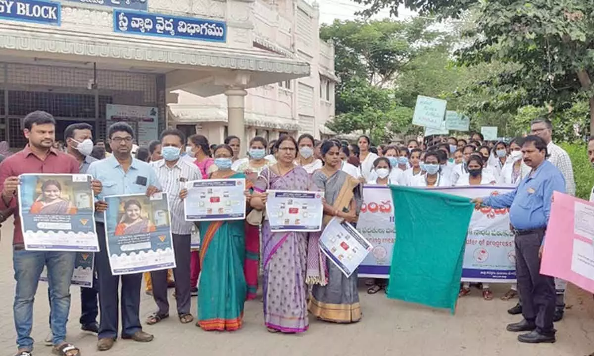 DM&HO Dr U Sreehari flagging off the World Population Day rally in Tirupati on Monday. Additional DM&HO Dr C Aruna Sulochana Devi and DIO Dr Santha Kumari are seen.
