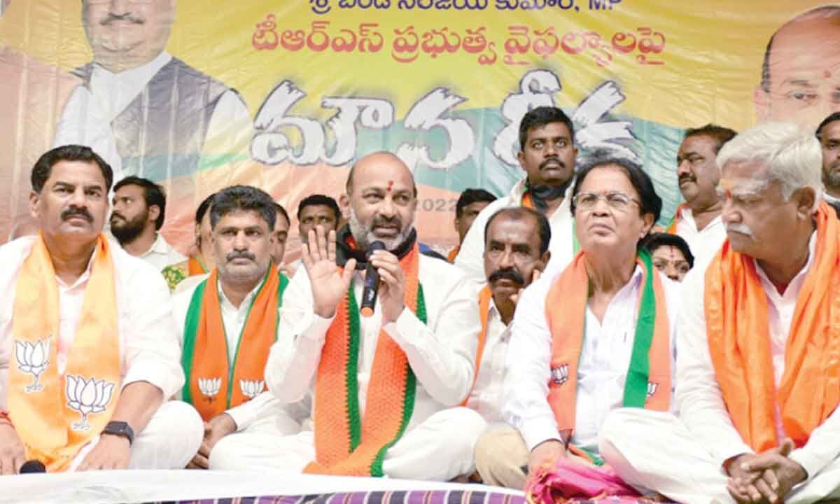 Bandi Sanjay slams CM KCR over podu land issues