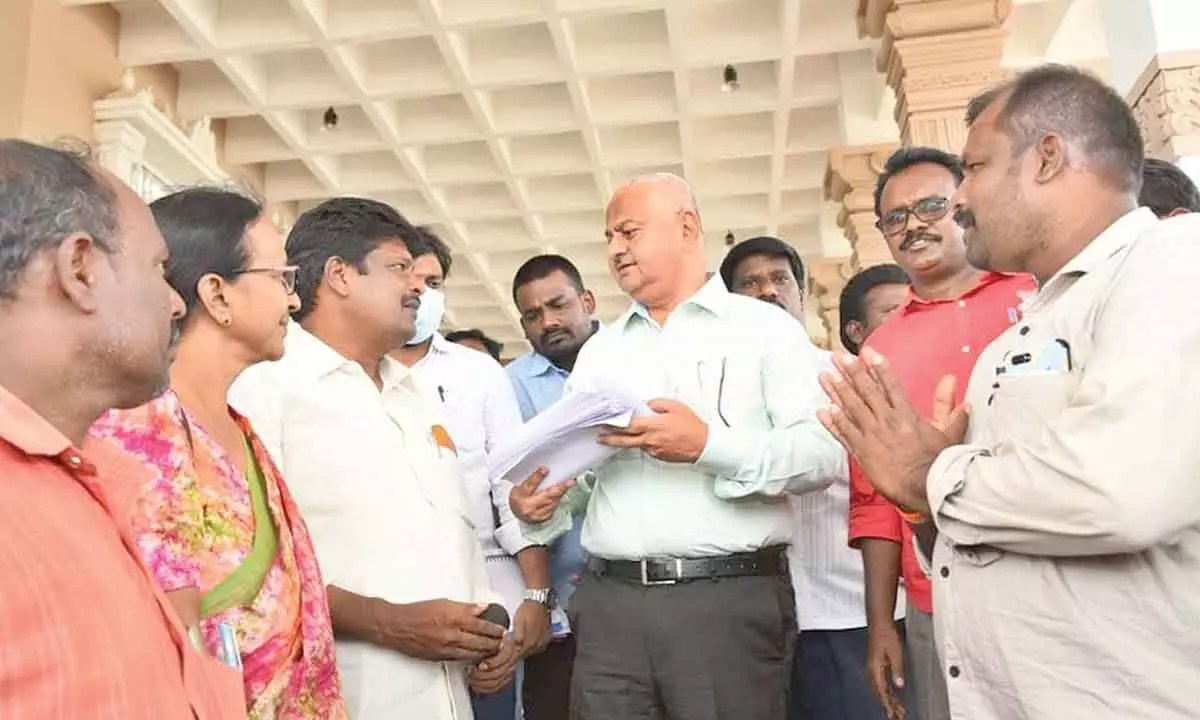 District Collector K Venkataramana Reddy receiving the representations from the CPM leaders at the Collectorate in Tirupati on Monday.