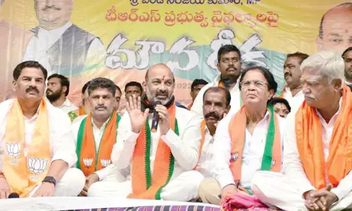 BJP leader B Sanjay Kumar speaking at Silent  Deeksha in Karimnagar on Monday.