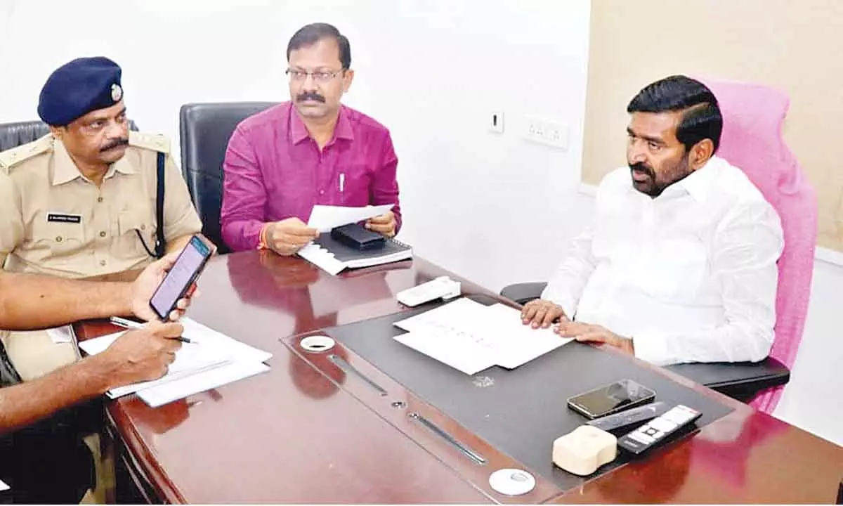 Minister Jagadish Reddy reviewing rains situation at a meeting with officials in Suryapet on Tuesday