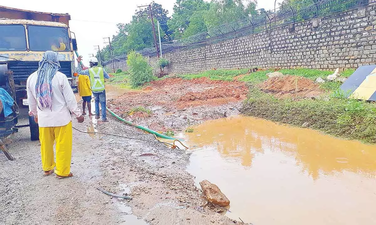 Hyderabad: Waterlogged trenches at Shivrampally give harrowing time to commuters