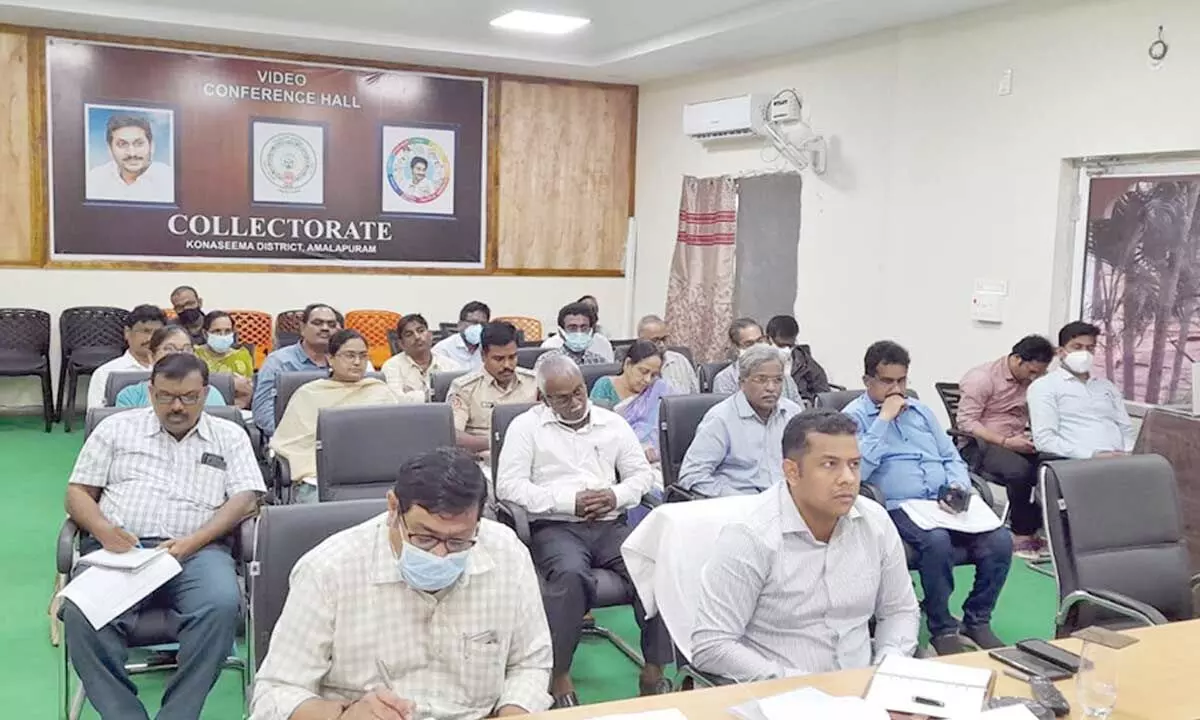 District Collector Himanshu Shukla attending a video conference with Chief Minister YS Jagan Mohan Reddy from his office in Amalapuram on Tuesday