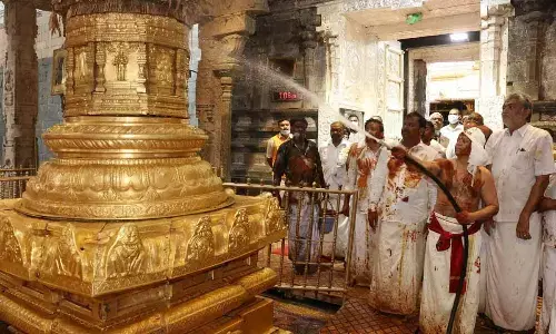 TTD EO A V Dharma Reddy and others taking part in Koil Alwar Tirumanjanam, a cleaning ceremony, at Srivari temple in Tirumala on Tuesday