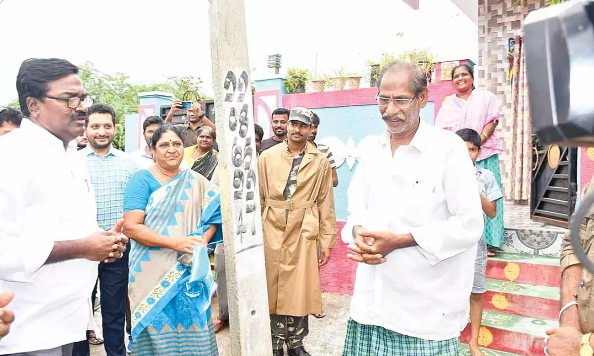 Transport Minister Puvvada Ajay Kumar requesting  people for moving to flood relief centers in  Bhadrachalam on Wednesday