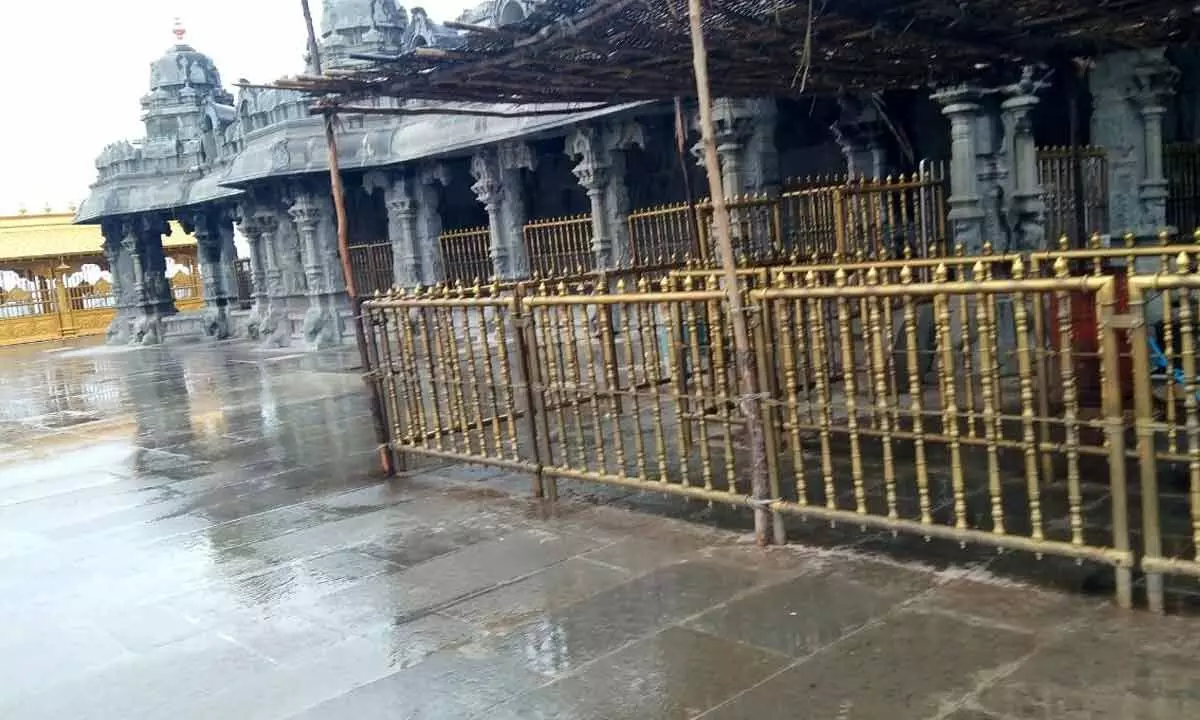 The queue compartments of Yadadri temple where devotees would jostle for space in normal days,  wears a deserted look on Wednesday