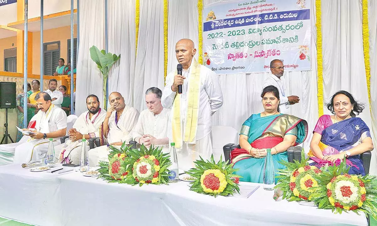TTD Executive Officer A V Dharma Reddy speaking at the parents meeting held at TTD SV High School in Tirumala on Wednesday. Singhania Group of Industries Chairman Goutam Singhania is also seen. Photo: K Radhakrishna