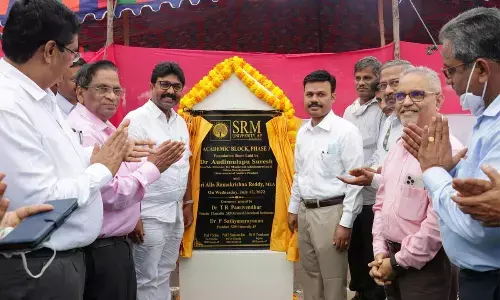 Minister Dr Audimulapu Suresh laying foundation stone for the academic block at SRM-AP University at Neerukonda on Wednesday
