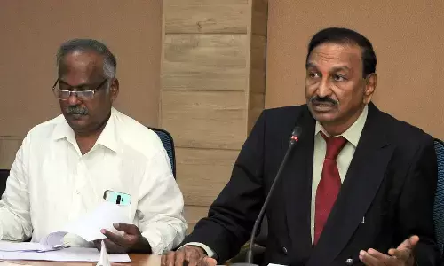 Dr NTR University of Health Sciences vice-chancellor Dr Syama Prasad Pigilam and Registrar Dr Sankar addressing a press conference on annual convocation at NTR University in Vijayawada on Wednesday 	(Hans photo: Ch Venkata Mastan)