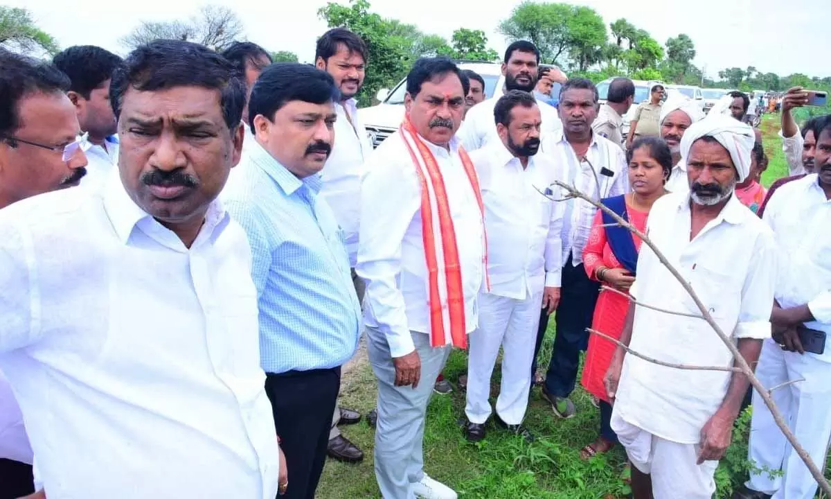 Minister for Panchayat Raj Errabelli Dayakar Rao inspecting flood-affected Samudrala village in Jangaon district on Thursday