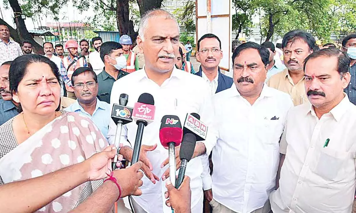 Health Minister T Harish Rao addressing the media after inspecting the construction works of a super-speciality hospital in Warangal on Monday. Photo: G Shyam Kumar