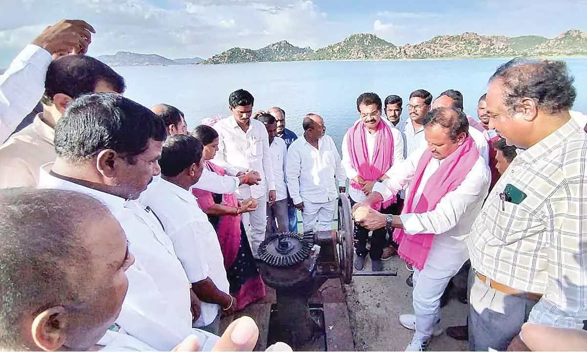 Devarkadra MLA Ala Venkateshwar Reddy and Narayanpet MLA Rajender Reddy releasing waters to left and right canals from Koilsagar on Tuesday