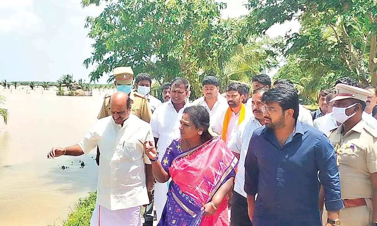 Puducherry Lt Governor Tamilisai Soundararajan inspecting flood-affected areas in Yanam on Tuesday
