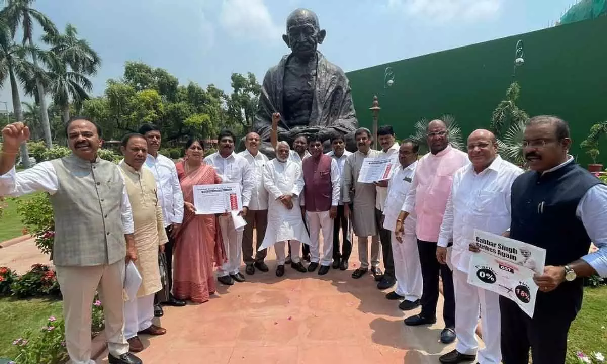 TRS MPs protesting against Centres policies in New Delhi on Tuesday