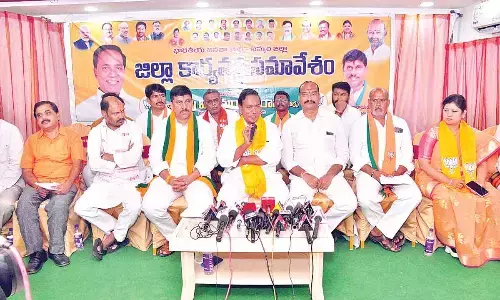 BJP senior leader Dr Vijaya Rama Rao speaking to media persons in Khammam on Tuesday