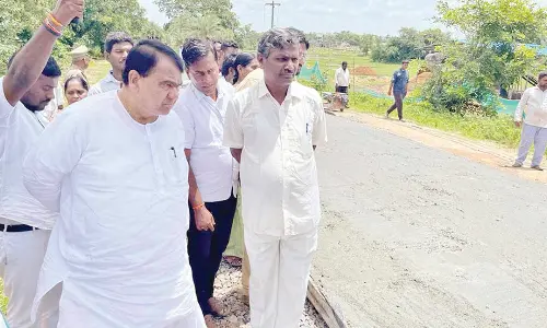 Speaker Pocharam Srinivas Reddy inspecting CC road works in Kamareddy district on Wednesday