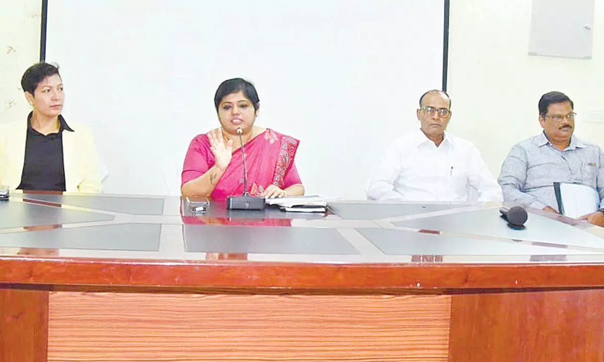 Mancherial District Collector Bharati Holikeri speaking at a review meeting in Mancherial on Thursday