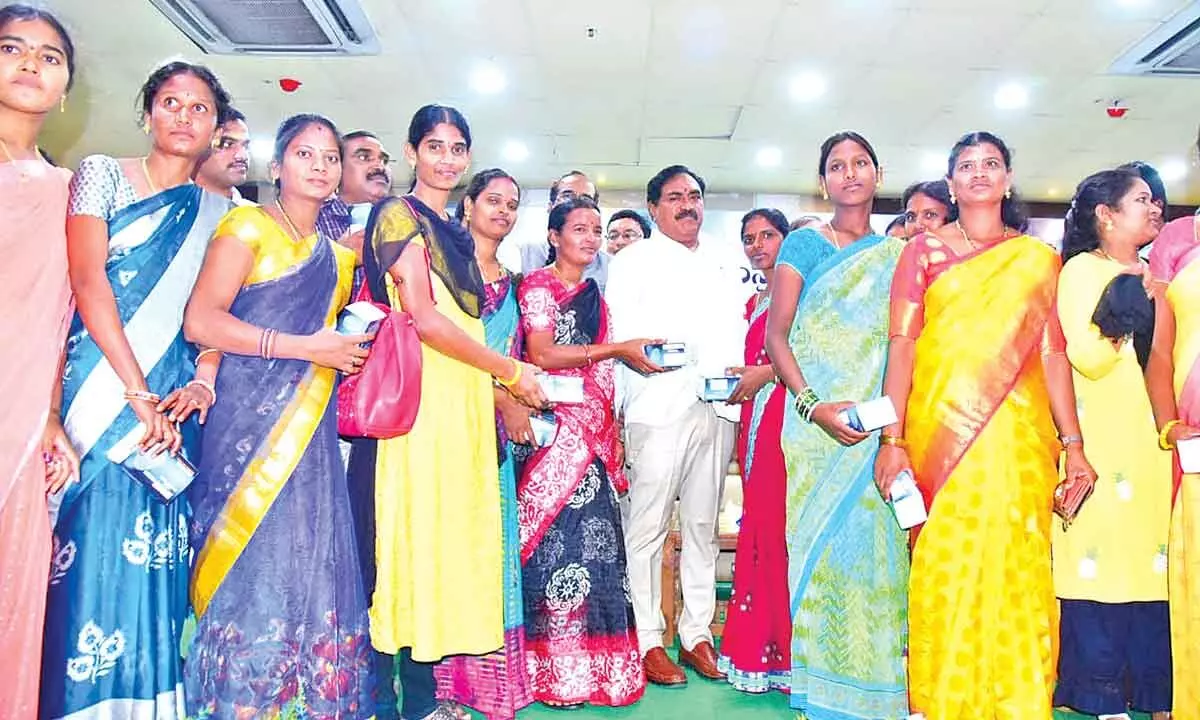 Errabelli Dayakar Rao hands over bio-metric devices to 424 Bank Sakhis