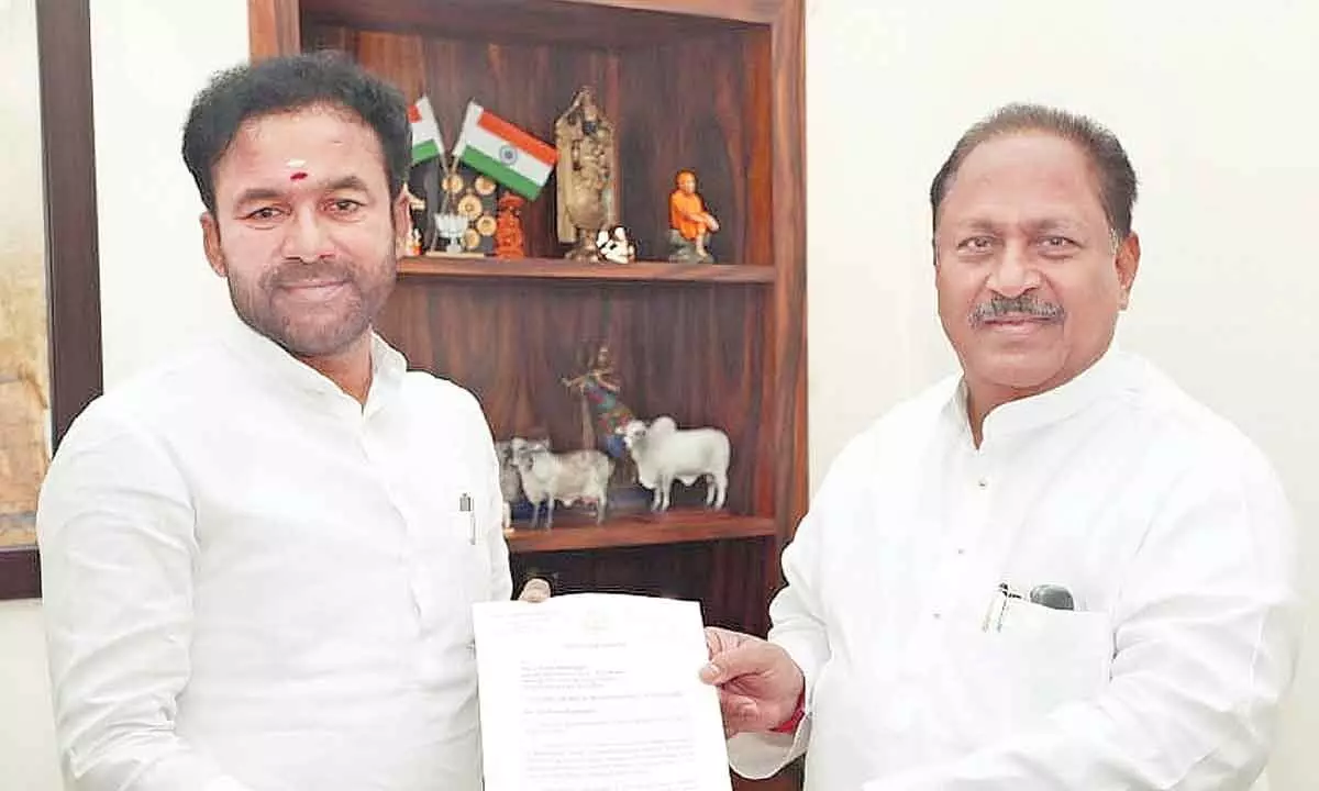 Deputy CM K Satyanarayana submits a memorandum for funds to develop temples in Anhdra Pradesh to Union tourism minister G Kishan Reddy in New Delhi on Thursday