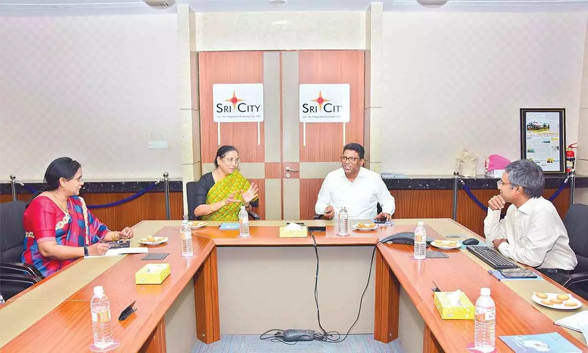 Sri City Founding Managing Director Ravindra Sannareddy, SPMVV Vice-chancellor Prof Jamuna, Registrar Mamatha and IIIT Sri City Director Prof G Kannabhiran hold discussions on the project aimed at skill development of rural women for their empowerment, in Sri City on Thursday.