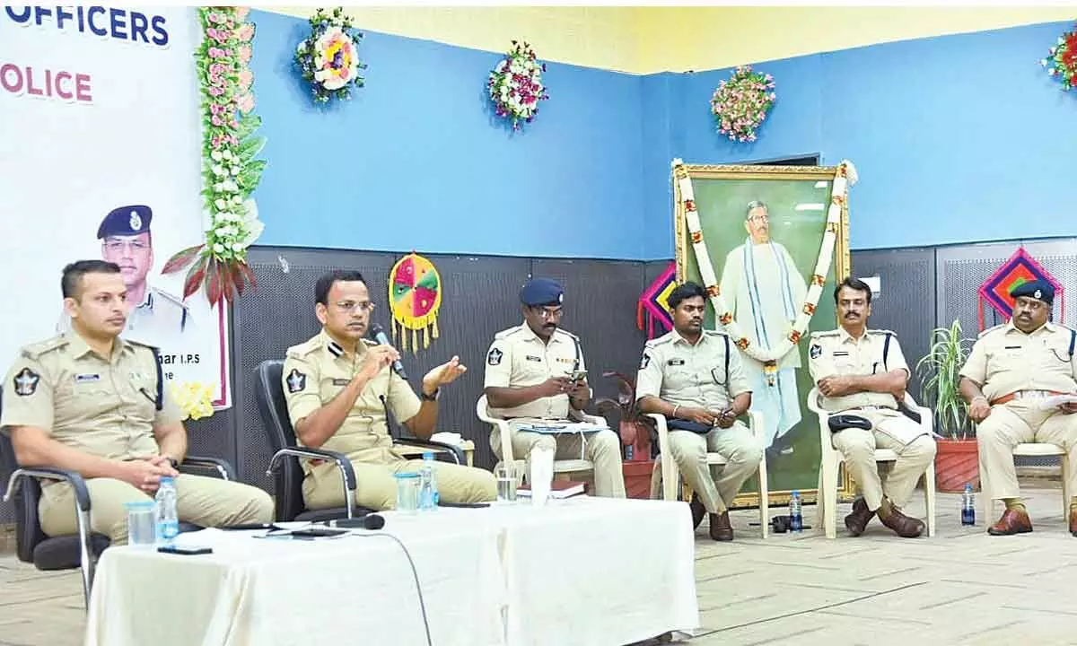 Kurnool Range Deputy Inspector General of Police (DIG) S Senthil Kumar addressing an orientation programme conducted at G Pulla Reddy Engineering College in Kurnool on Thursday. SP Siddarth Kuashal, DSPs and other police personnel are also seen.