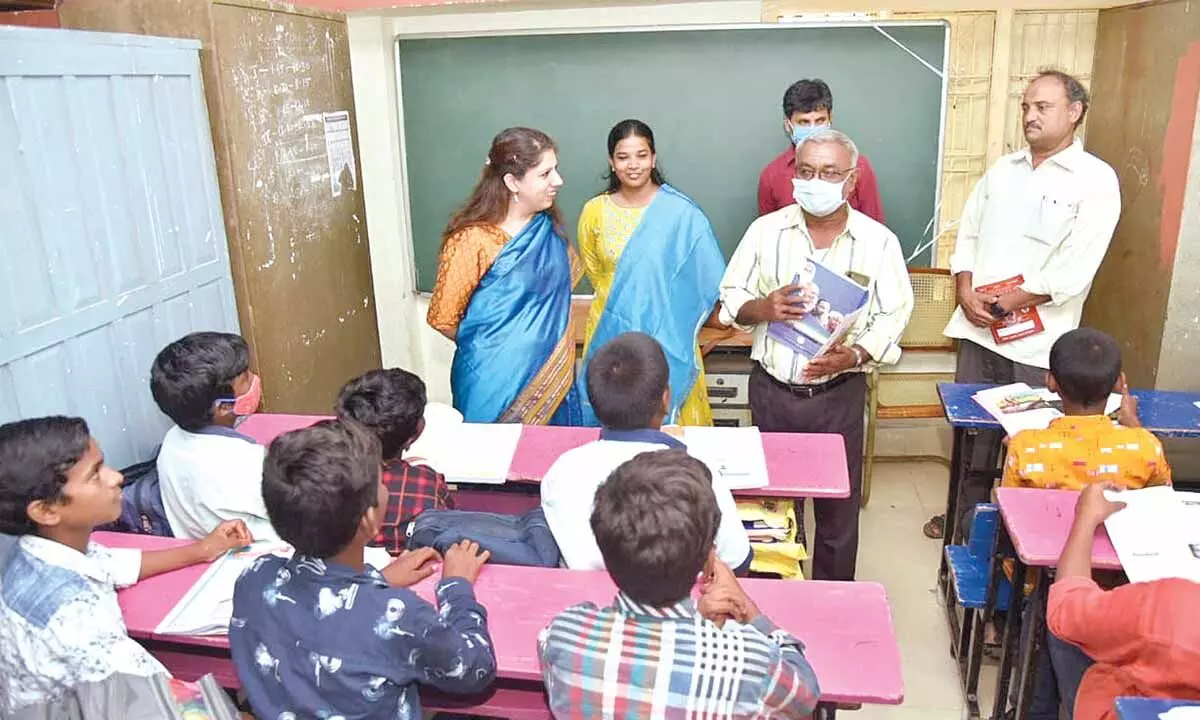 District Collector Krithika Shukla inspecting the Shri Sheth Peraji Lumbaji Zilla Parishad High School at Gollaprolu of Pithapuram Mandal in Kakinada district on Saturday
