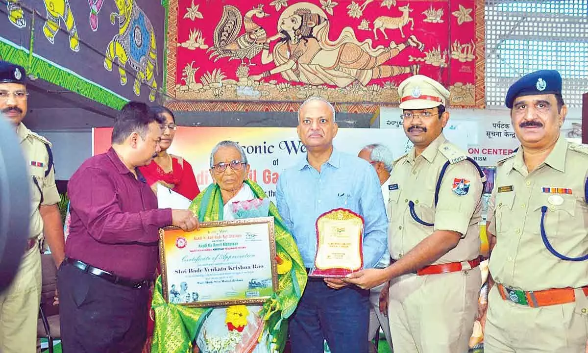 Rampilla Narasayamma, wife of the late freedom fighter Suryanarayana was felicitated by DRM Shivendra Mohan at the railway station in Vijayawada on Saturday.