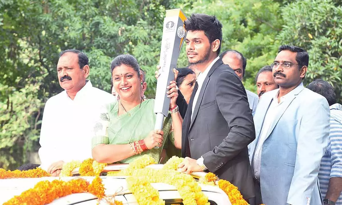 Minister RK Roja, MLA Bhumana Karunakar Reddy Grand Master Akash and others participating in a rally jointly organised by the Chittoor District Olympic Association and SAAP in Tirupati on Saturday