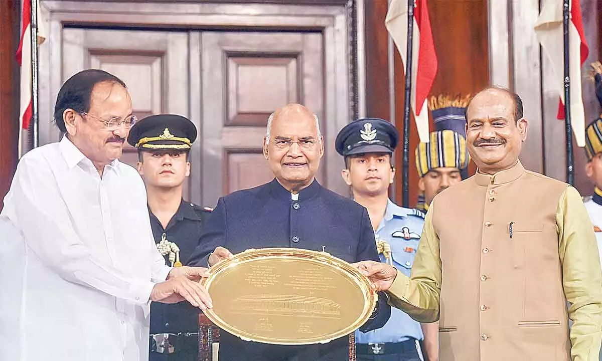Outgoing President Ram Nath Kovind being felicitated by Vice-President Venkaiah Naidu and Lok Sabha Speaker Om Birla during the farewell function at Parliament House in New Delhi on Saturday