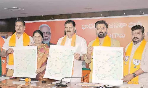 Dr G Manohar Reddy, the BJP State vice-president and others releasing the road map of State BJP chief Bandi Sanjay Kumar’s Yatra in Hyderabad on Saturday