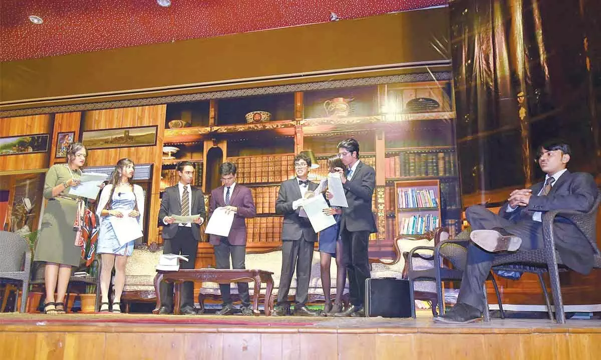 Students perform a play for charity purpose