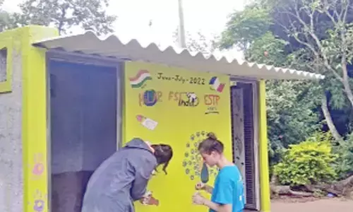 French students construct toilets for tribals