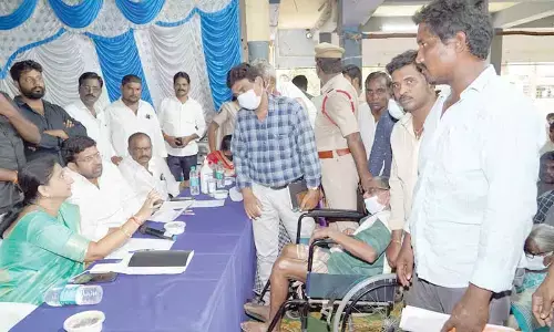 District Collector K Madhavi Latha and MLA Jakkampudi Raja listening to public problems during Spandana programme at Srivalli Subrahmanyeswara Swamy Kalyana Mandapam in Korukonda on Monday