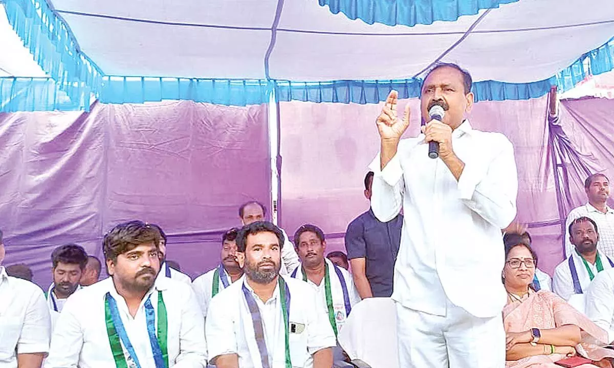 MLA Bhumana Karunakar Reddy addressing bank shareholders and people at the oath taking ceremony of the newly-elected members of the banks governing body at Tirupati Cooperative Bank Limited premises on Monday