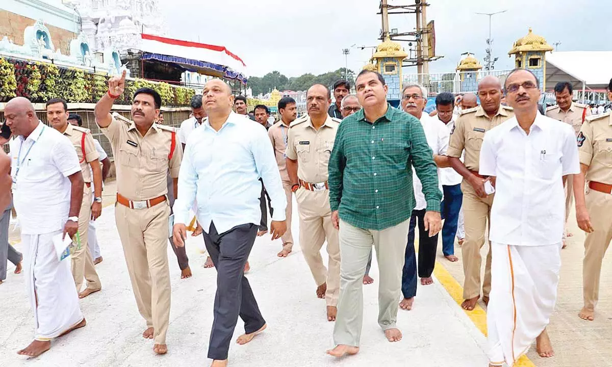 Tirupati SP P Parameswar Reddy and TTD CVSO Narasimha Kishore inspecting the Mada streets around the main temple at Tirumala on Tuesday