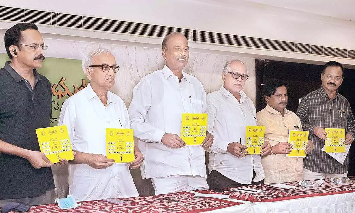 Sumadhura Kala Niketan president S Narasa Raju and others releasing brochure on hte comedy playlet competitions, in Vijayawada on Wednesday