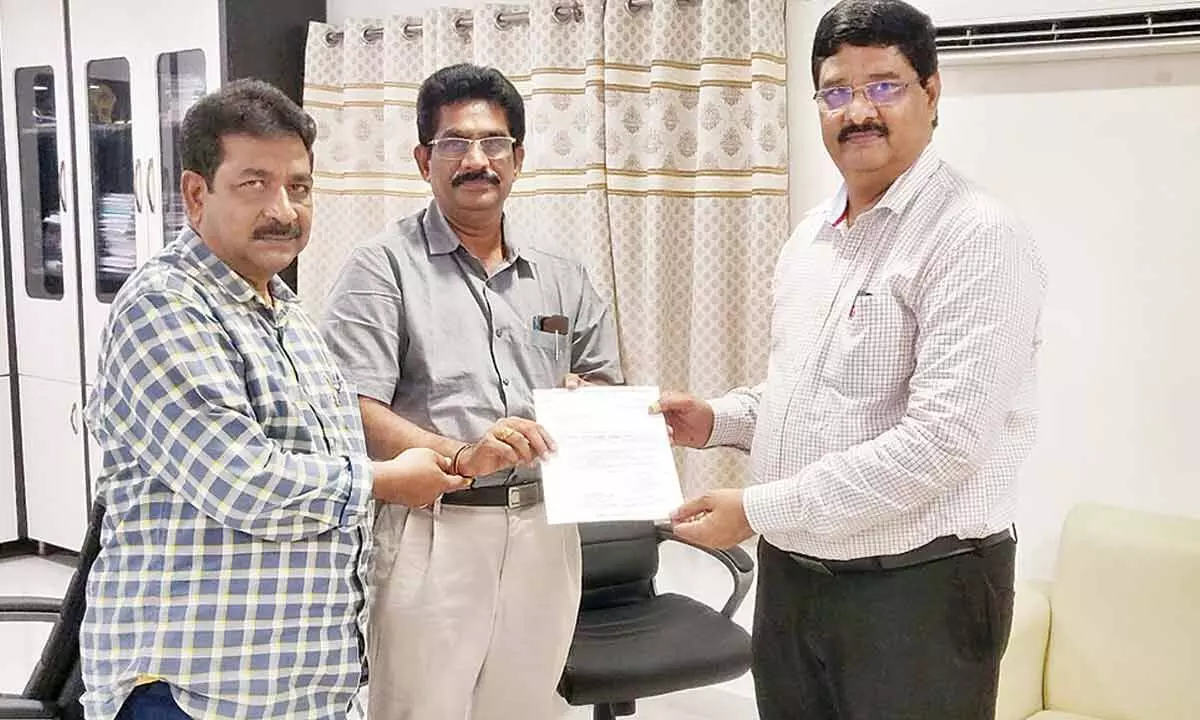 ABRSM State convenor Prof Y V Rami Reddy submitting a representation to the chairman of APSCHE Prof K Hemachandra Reddy