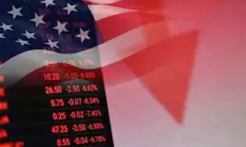 US economy shrinks 0.9% in April to June