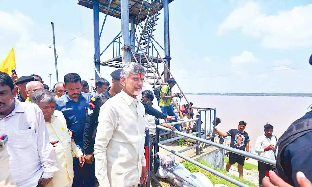 Former CM and TDP chief N Chandrababu inspecting flood on the Godavari river bund ( Karakatta) in Bhadrachalam on Friday