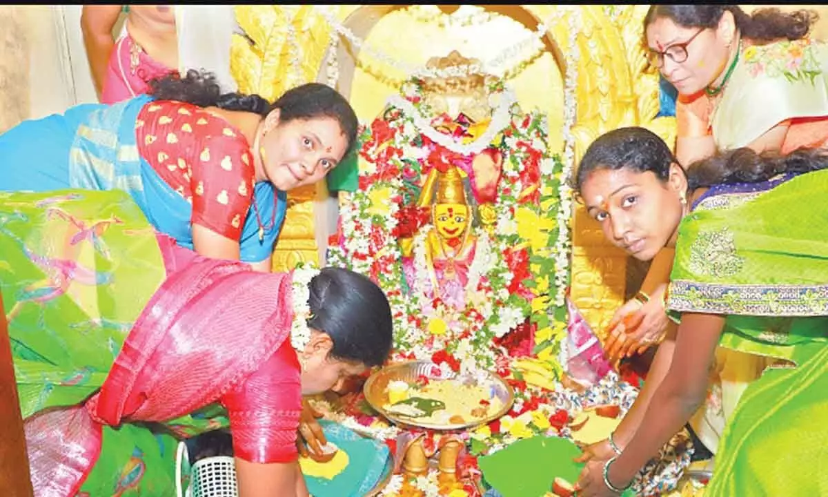 Women performing Shravana Masam rituals in Karimnagar on Friday