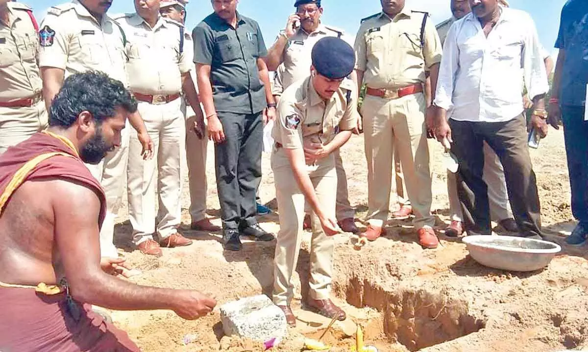 Bapatla district SP Vakul Jindal performing bhumi puja for the construction of Police Parade Ground in Bapatla on Friday