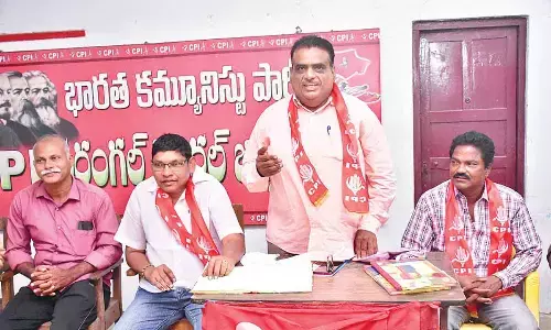 CPI State secretariat member Takkalapally Srinivas Rao speaking at a meeting at Shiva Nagar in Warangal on Friday