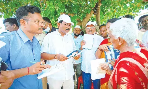 Municipal Administration Minister Dr A Suresh interacting with public as part of ‘Gadapa Gadapaku Mana Prabhutvam’ programme at Yerragondapalem on Friday