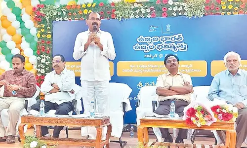 MLA Bhumana Karunakar Reddy addressing the Bijili Mahotsav organised at SPDCL corporate office in Tirupati on Saturday.